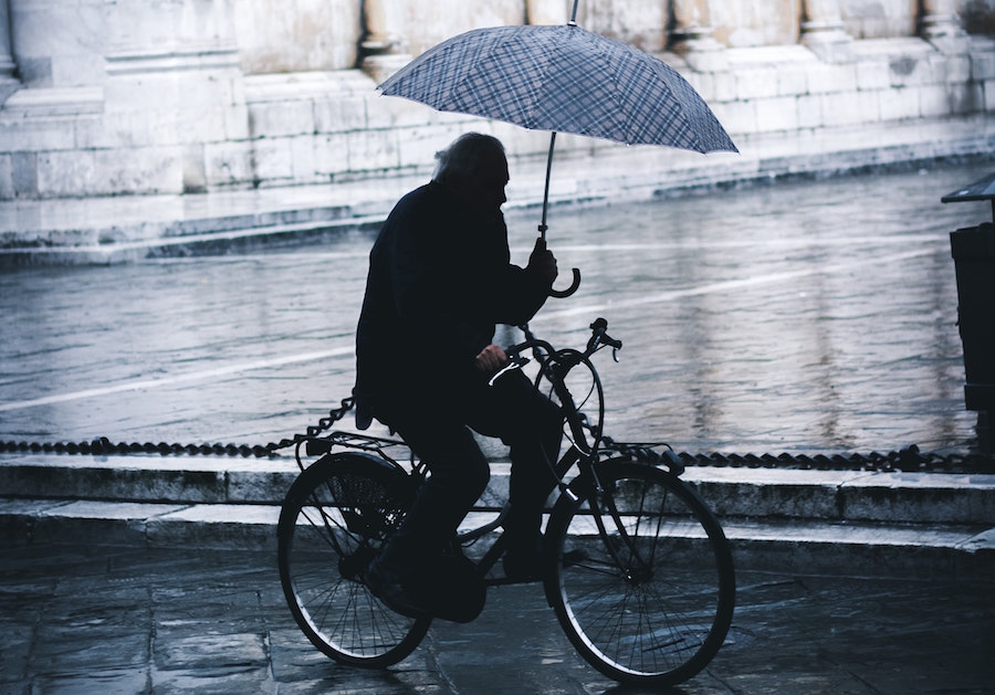 Riding a bike store in the rain